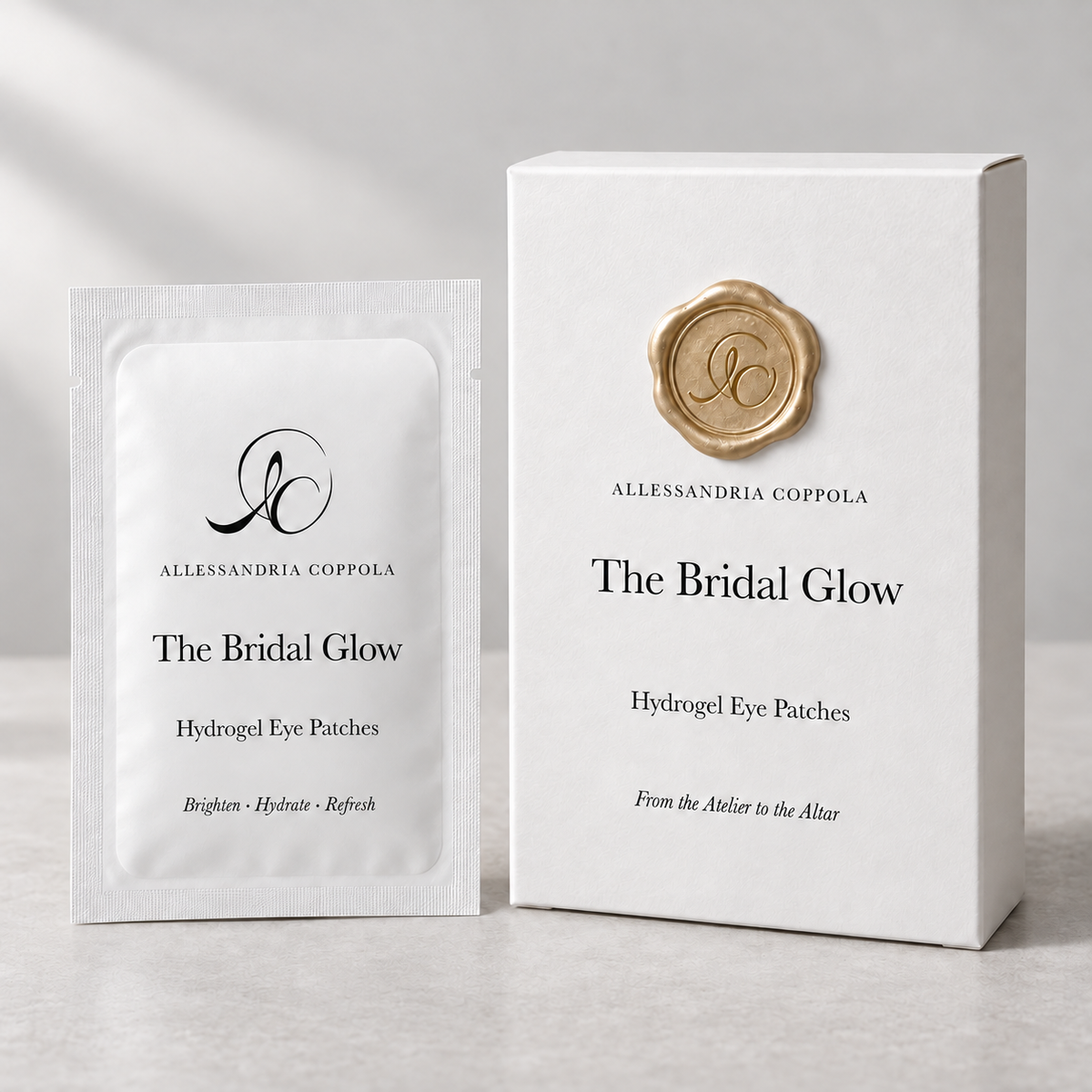 The Bridal Glow white box with gold wax seal and matching hydrogel eye-patch sachet — packaging design preview